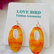 Load image into Gallery viewer, Orange Oval Resin Earrings
